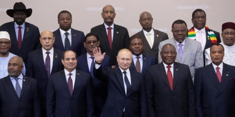 Russia-s-president-vladimir-putin-waves-during-a-family-photo-with-heads-of-countries-taking-part-in-the-2019-russia-africa-summ.jpeg